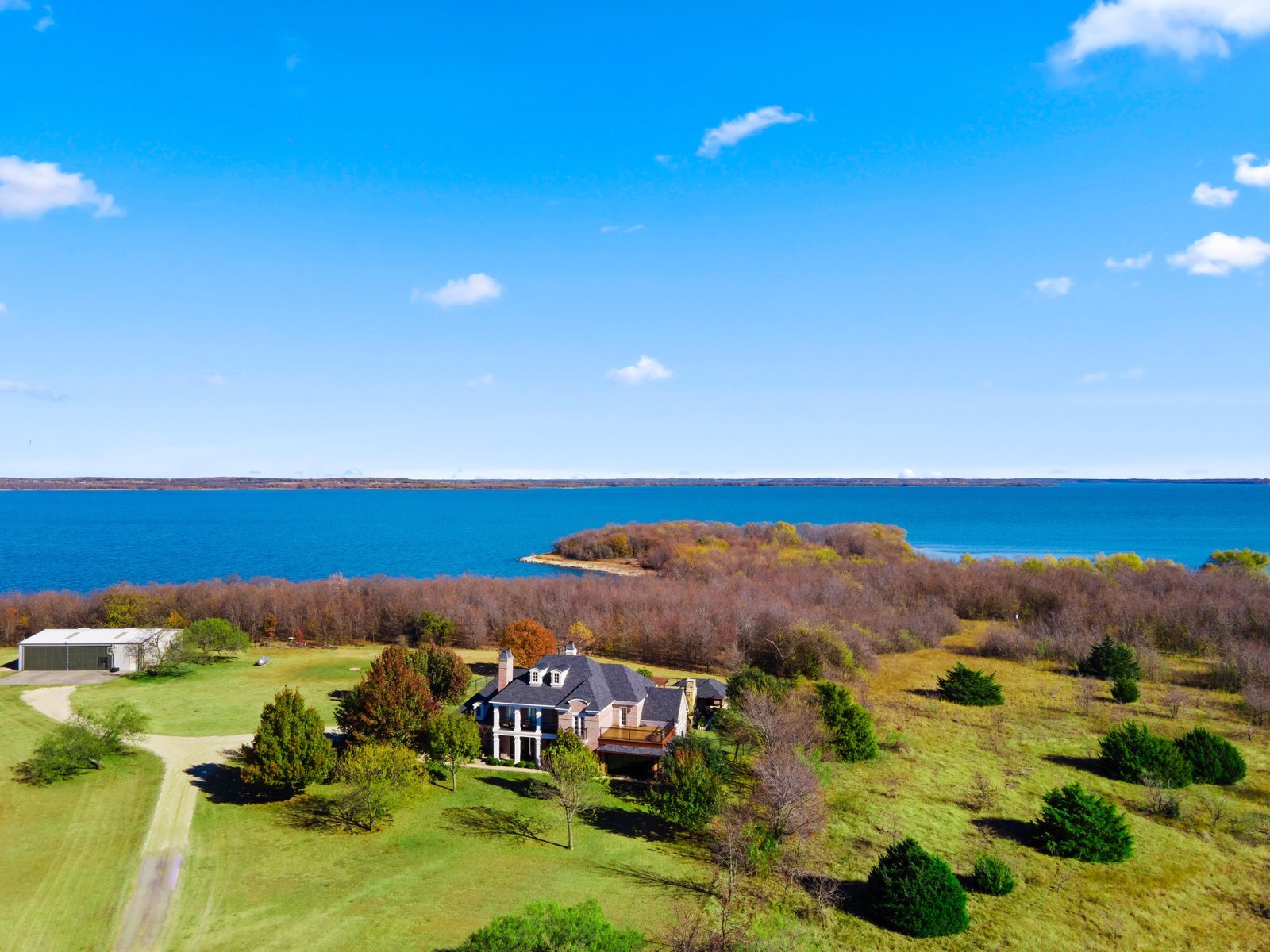 Aerial view of Estate on Lake Ray Roberts on five acres beside the lake